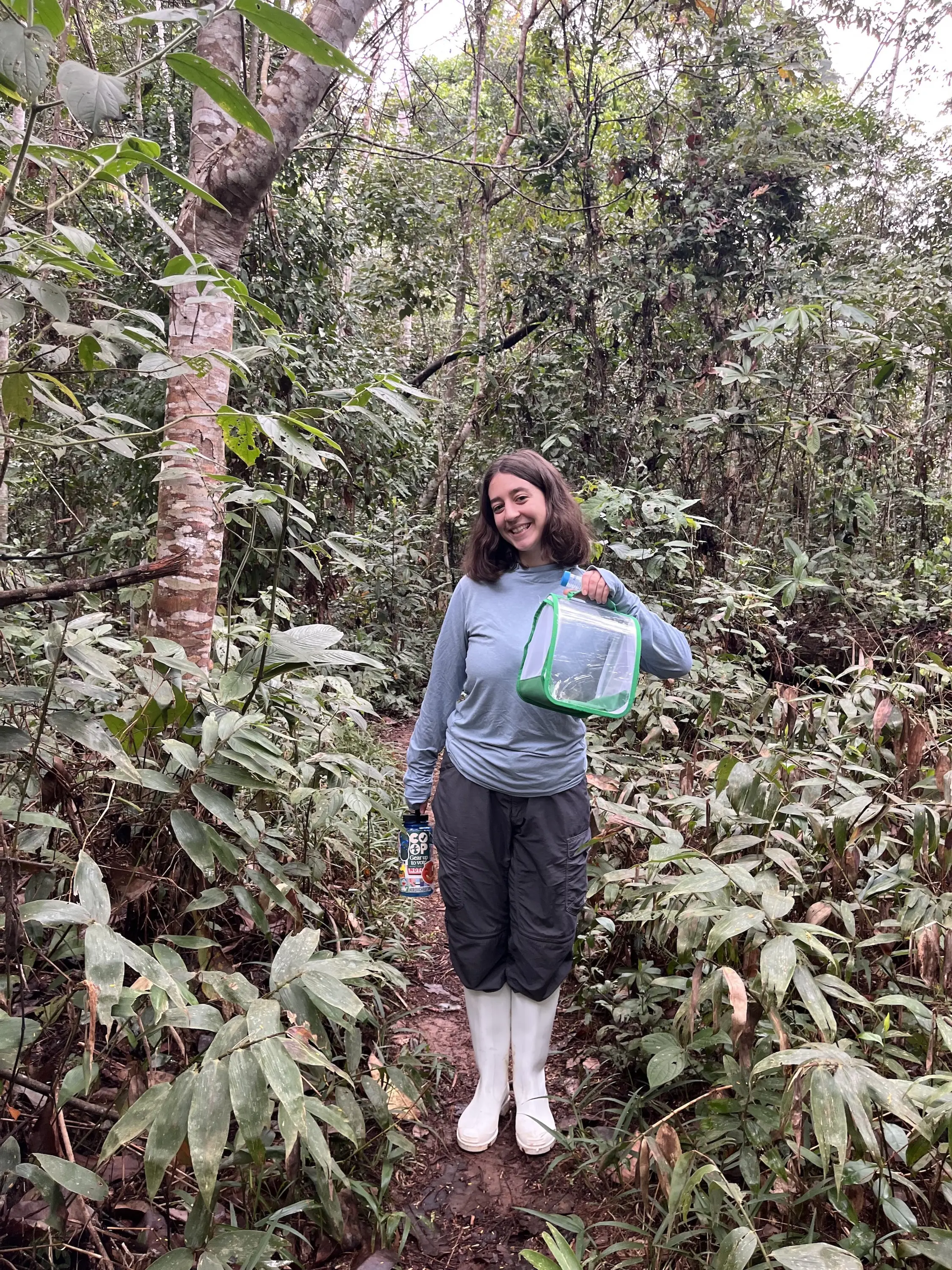 Headwaters alum Dixie Baronofsky conducting scientific research during a university field study in the Amazon rainforest.