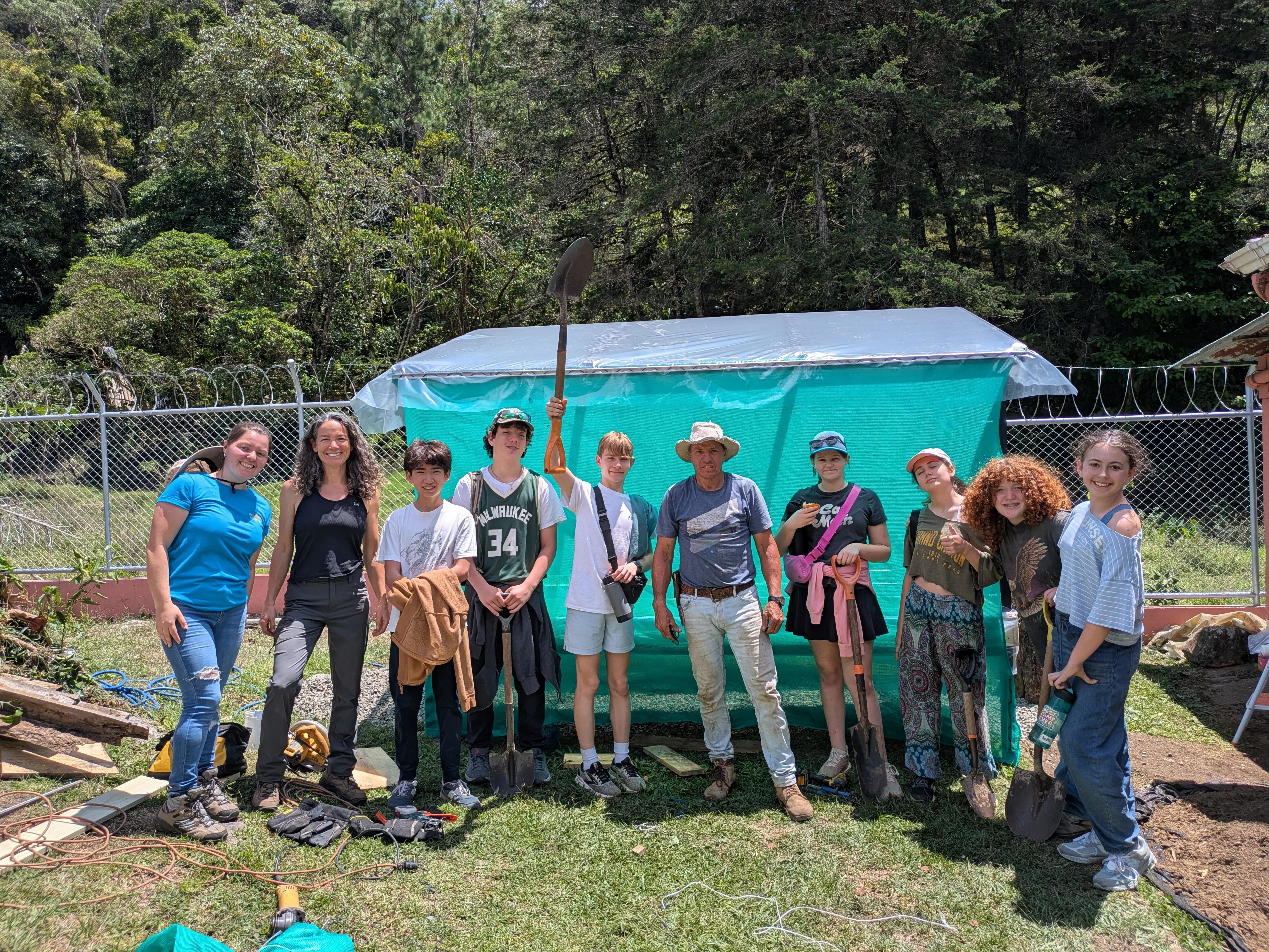 Middle school students participating in service learning during Costa Rica trip.
